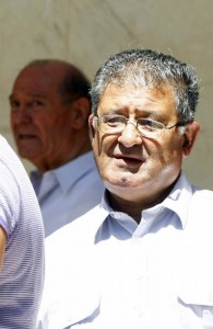 Priests Father Charles Pulis and Father Godwin Scerri walk out of the Law Courts in Valletta