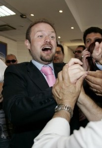Newly-elected Malta Labour Party leader Muscat is greeted by supporters at party headquarters before a rally outside Valletta