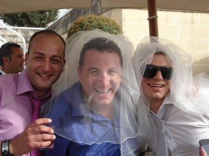 Natius Farrugia tal-Labour (centre) of Natius Ola waxing salon