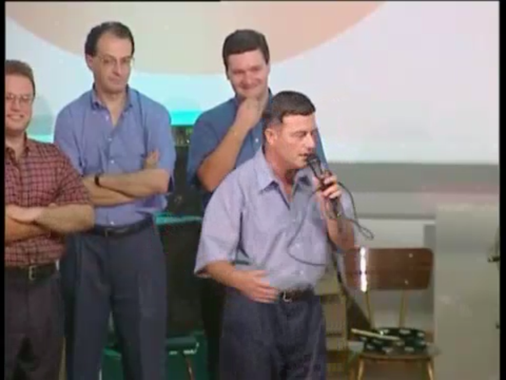 A dorky Joseph Muscat (far left) listening admiringly to his boss Sant . No wonder poor Simone got confused.