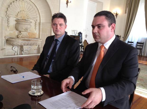 Owen Bonnici, the Minister of Justice, with the most notorious member of the cabinet