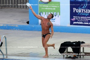 Rainer Scerri hurls a bottle during a fight after a waterpolo match