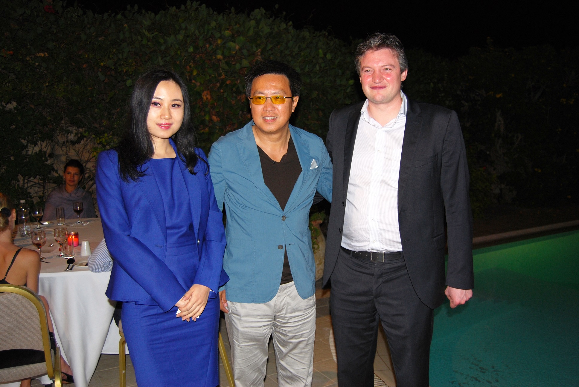 The Minister of Health and Energy and Malta Enterprise's woman in Shanghai, Sai Liang MIzzi, with Han Bin, managing director of Chinese-government-owned Leisure Clothing Ltd, which abuses Chinese, North Korean and Vietnamese indentured labourers on Maltese soil.