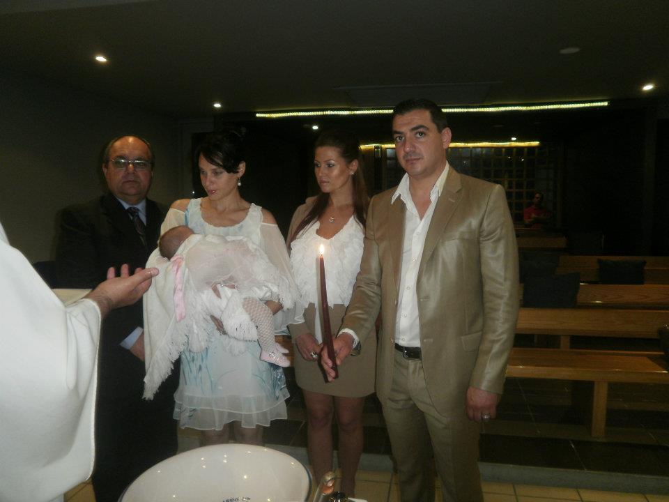 Standing as godfather to the baby of Romanian stripper Luciana Loredana Secan and her boyfriend, underworld operator Darren Grima
