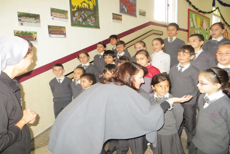 Here I am meeting some schoolchildren. I went to this school because I am going to build headquarters for my Marigold Foundation on land owned by the nuns who run the school, so obviously I have to suck up to them a bit. Heqq, x'taghmel hu?