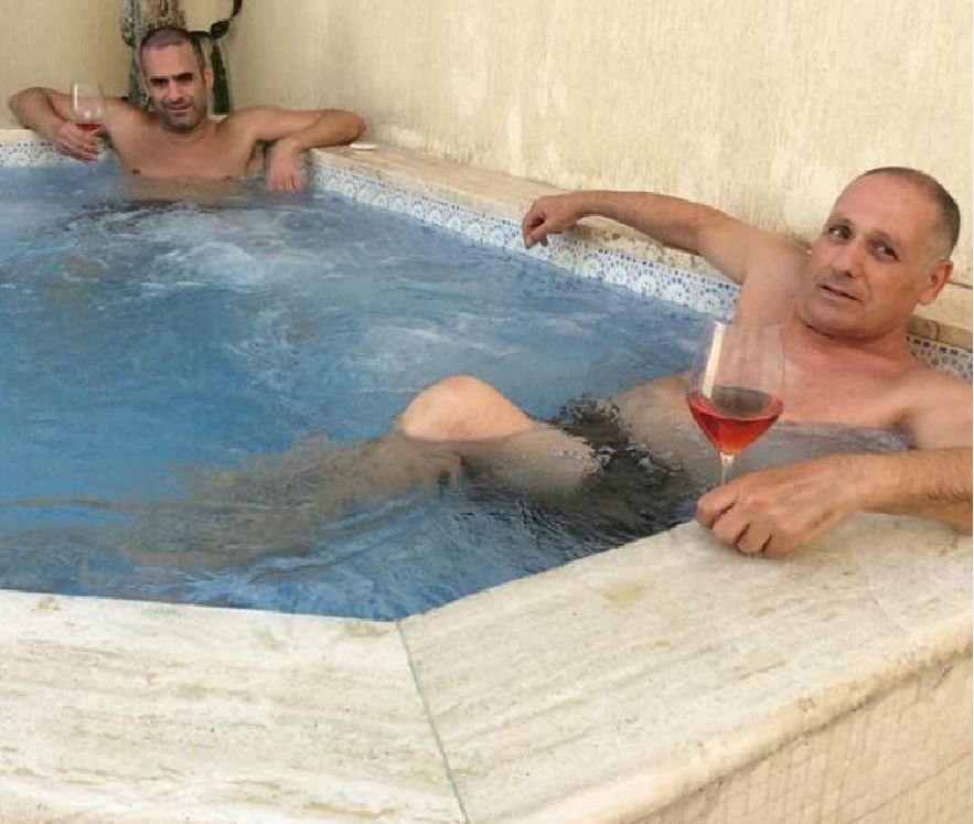 Armed Forces of Malta deputy commander Mark Mallia (at rear of picture), close friend of the Spouse of the Prime Minister, relaxes in a rooftop Jacuzzi with his father Joseph.