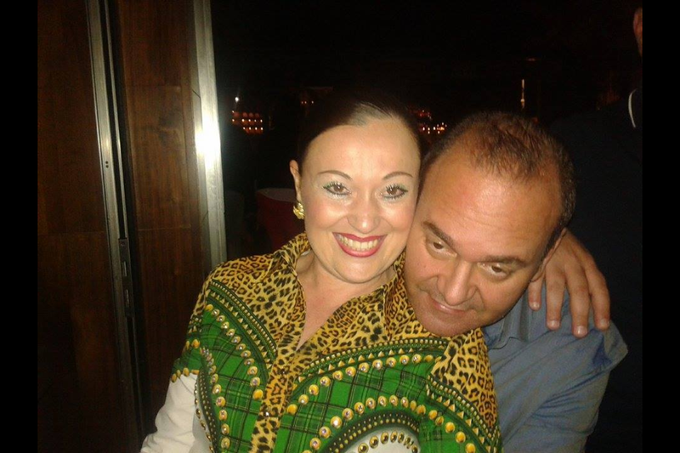 The Minister for the Economy, Chris Cardona, with a woman who is not his wife, at a bar owned by underworld operator Hugo Chetcuti, last year.