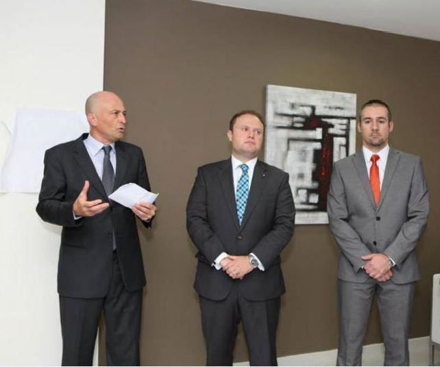 Brian Tonna and Karl Cini with Joseph Muscat, who declared the new offices of Nexia BT officially open.