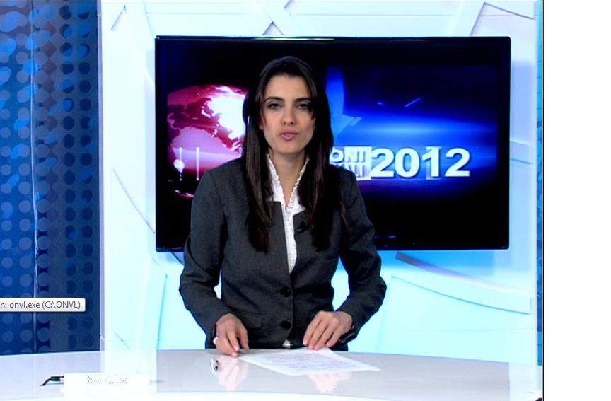 Wendy Borg, newscasting for the Labour Party's television station, Super One.